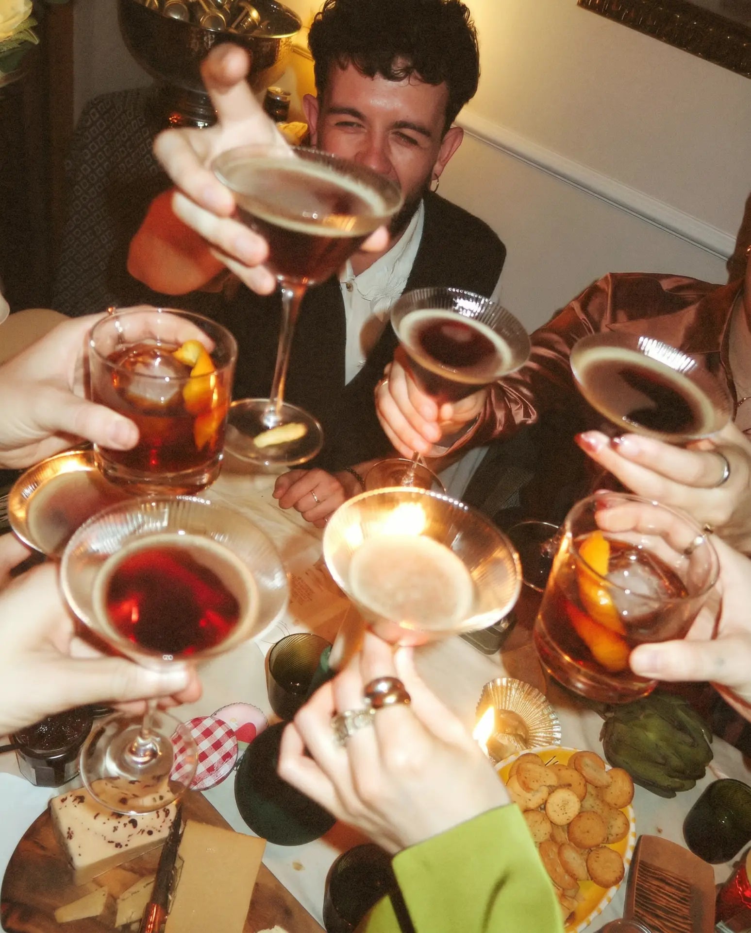 Friends raising a toast with Mala Madre